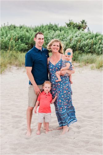 Family playing during Family Beach Portraits in Melbourne Beach, Florida