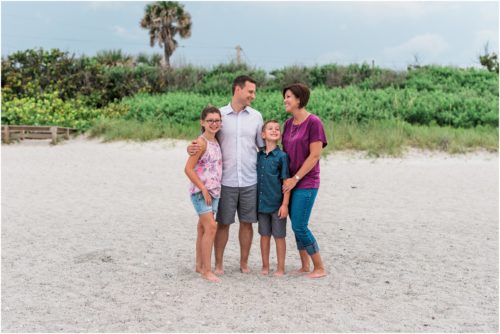 Family walking on beach with serapes Central Florida Family Photography