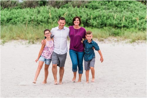Family walking on beach with serapes Central Florida Family Photography