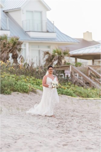 Bride walking on beach Melbourne Beach elopement