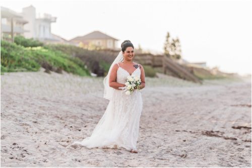 bride walking on the beach Melbourne Beach elopement