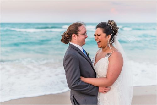 Bride laughing with groom Melbourne Beach elopement