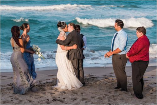 First kiss by the ocean Melbourne Beach elopement