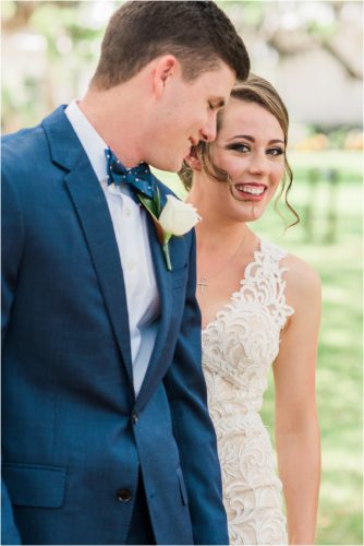 Bride peaking around groom Up The Creek Farms Wedding Photography