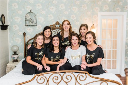 Girls laughing on bed Up The Creek Farms Wedding Photography