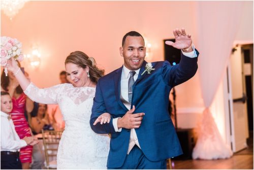 Couple waving Grand Manor Wedding