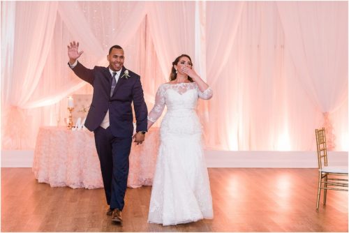Couple blowing kisses at Grand Manor Wedding