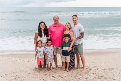 Entire family by water with three little boys with Melbourne Beach Photographer Liz Cowie