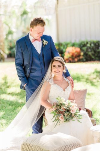 Bride and groom on couch from crystal and crates at Up the Creek Farms Melbourne Wedding Photographer