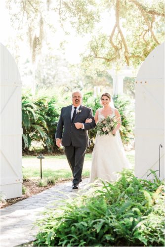 Bride with her dad walking her down the aisle at Up the Creek Farms Melbourne Wedding Photographer
