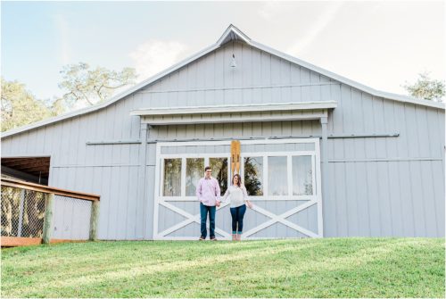 Couple in front of Boathouse during Up the Creek Farms Engagement photography