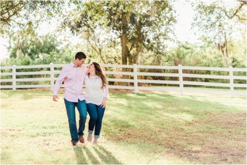 Couple walking during Up the Creek Farms Engagement photography