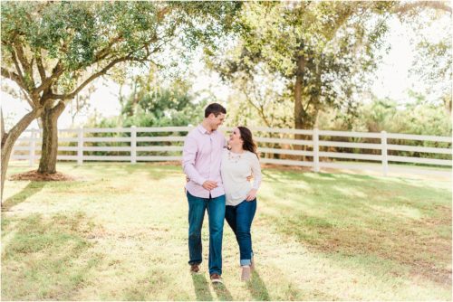 Couple laughing during Up the Creek Farms Engagement photography