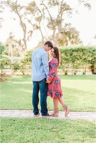 Couple on ground during Up the Creek Farms Engagement photography
