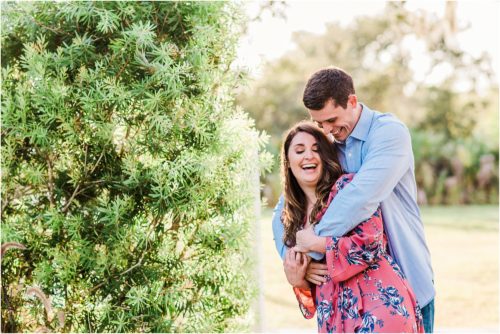 Couple laughing during Up the Creek Farms Engagement photography