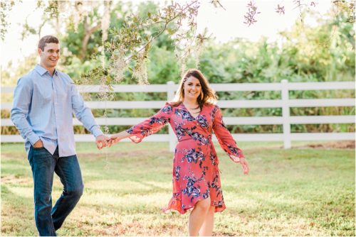 Couple holding hands during Up the Creek Farms Engagement photography