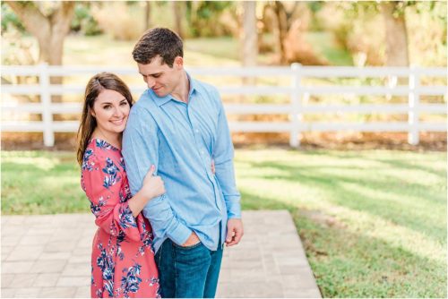 Couple near boathouse during Up the Creek Farms Engagement photography