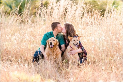 Couple in field with dogs Melbourne Florida Family Photography