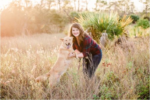 A girl and her dog in a field Melbourne Florida Family Photography