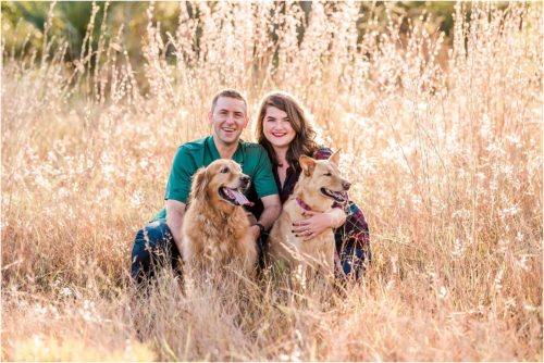 Couple in field with dogs Melbourne Florida Family Photography