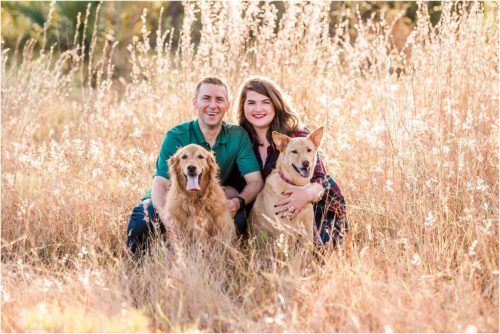 Couple in field with dogs Melbourne Florida Family Photography