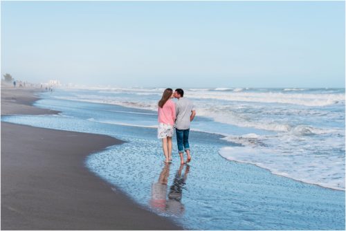 couple walking down beach during a Florida Beach Proposal