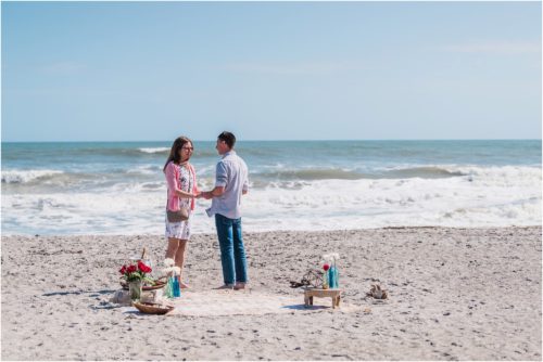 man getting ready to pop the question during a Florida Beach Proposal