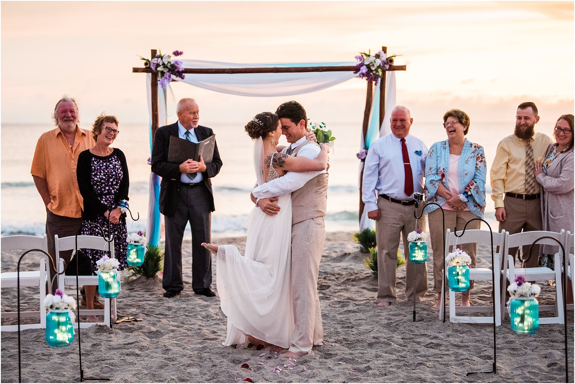 Bride and groom hugging after ceremony during Cocoa Beach Sunrise Wedding