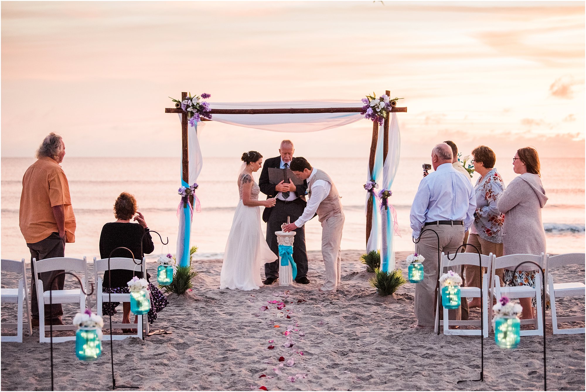 Bride and groom doing a sand ceremony during Cocoa Beach Sunrise Wedding