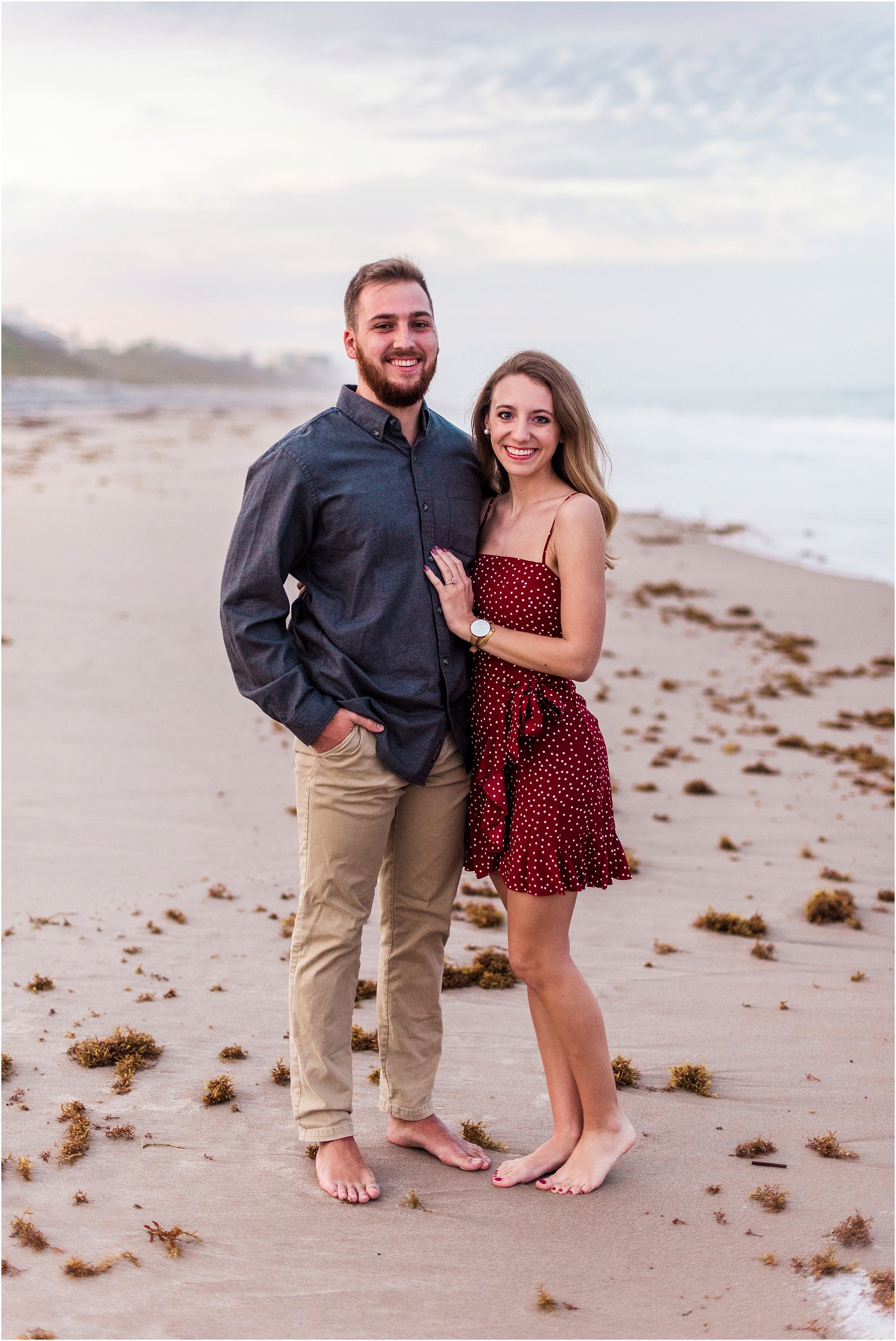 couple on beach during Floridana Beach engagement