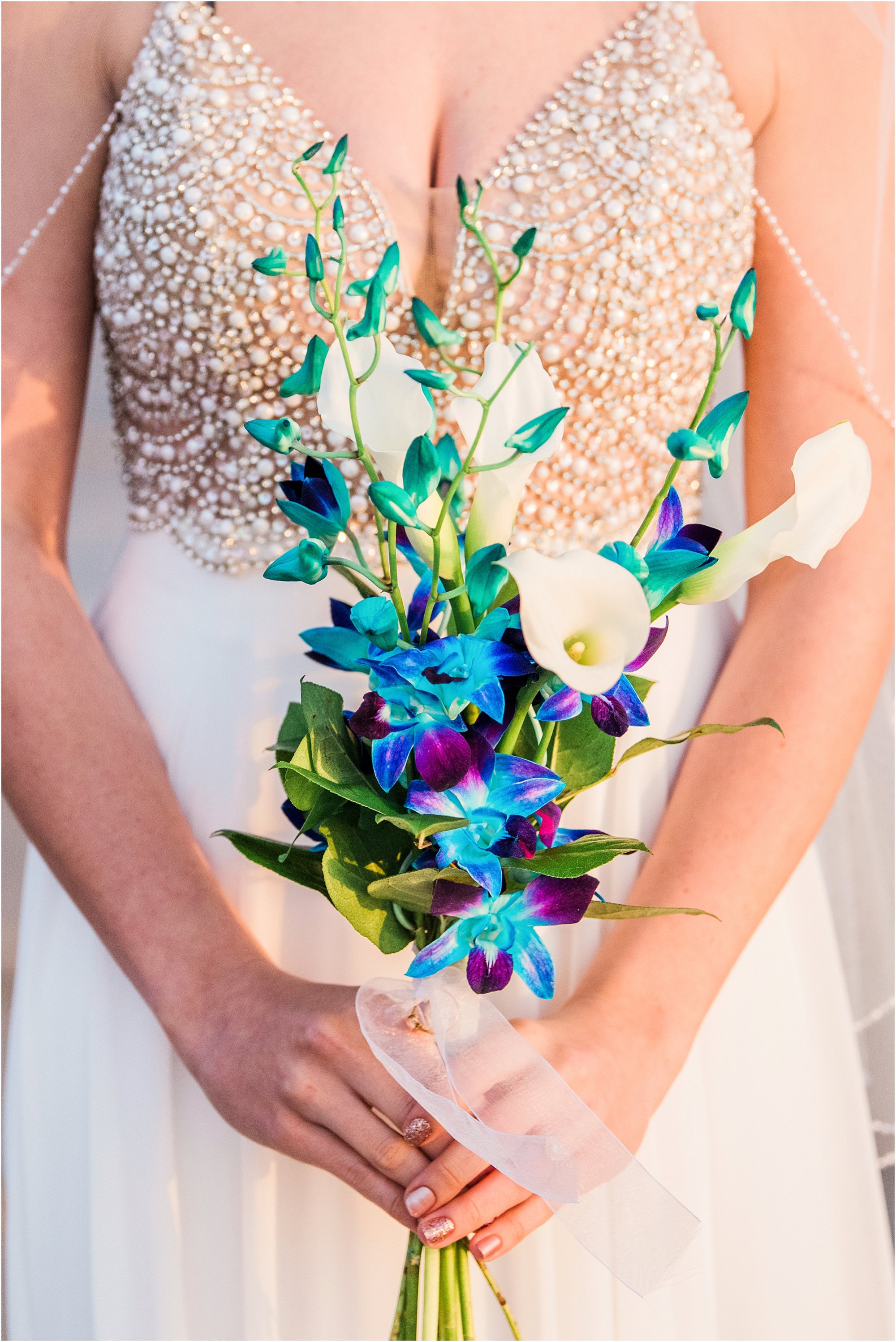 Blue and purple bouquet during Cocoa Beach Sunrise Wedding