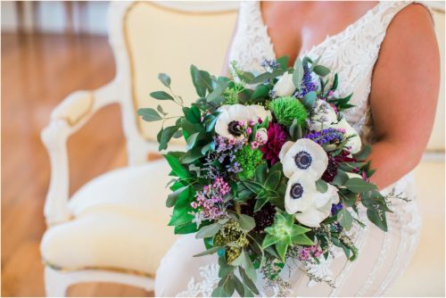 Bride with bouquet from Buds et purple flowers at Banyan Estate Wedding