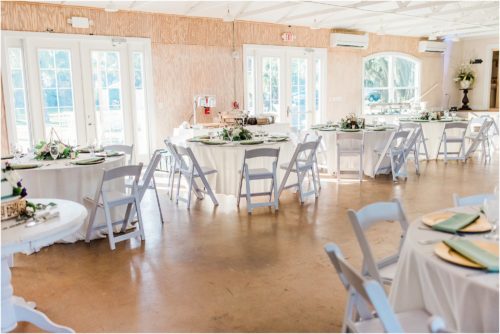 Reception room with geometric centerpieces by Buds etc at Banyan Estate Wedding