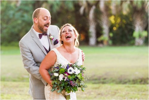 couple standing outside laughing together at Banyan Estate Wedding