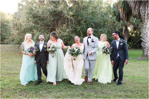 Wedding party walking and laughing at Banyan Estate Wedding