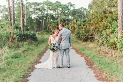 couple walking hand in hand at Banyan Estate Wedding