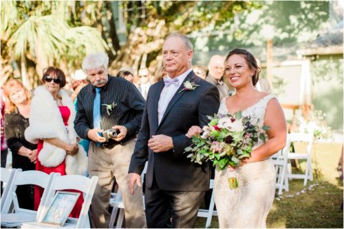 Bride walking down the isle with uncle at Banyan Estate Wedding