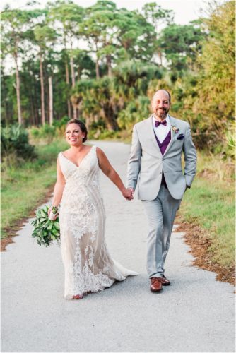 couple walking hand in hand at Banyan Estate Wedding