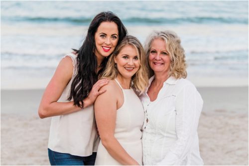 Newly engaged girl on beach with mom and friend during Satellite Beach Surprise Proposal