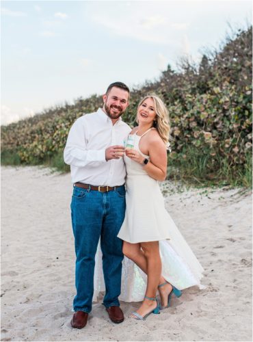 Couple celebrating during Satellite beach proposal