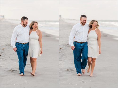 Man and girl in white dress walking down beach during Surprise Proposal
