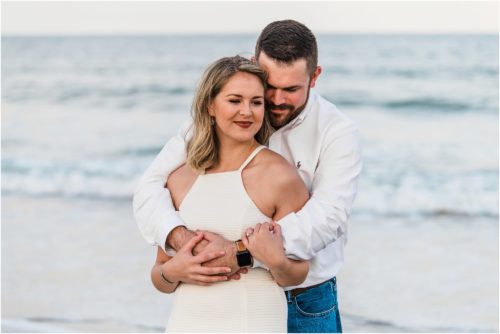 Newly engaged couple on beach Satellite Beach Surprise Proposal
