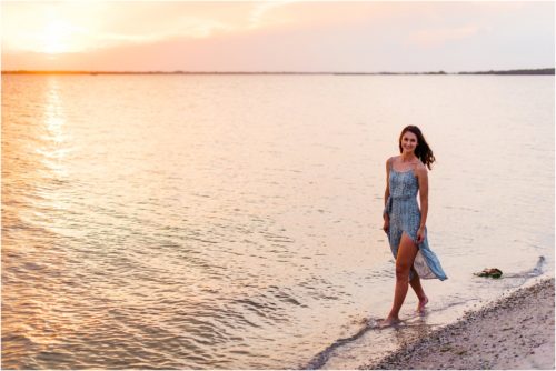 Girl walking by edge of water Melbourne Beach Senior Photography