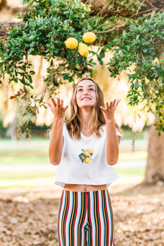 Girl juggling lemons Riverside Park Senior Portraits