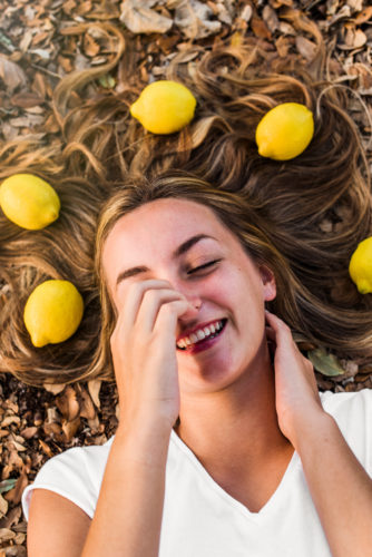 girl with lemons in her hair Riverside Park Senior Portraits