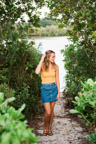 Girl in yellow top and blue skirt Riverside Park Senior Portraits