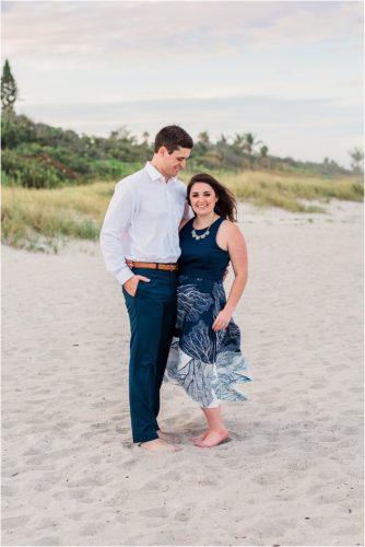 Couple by dunes Best Engagement Session Beach Locations
