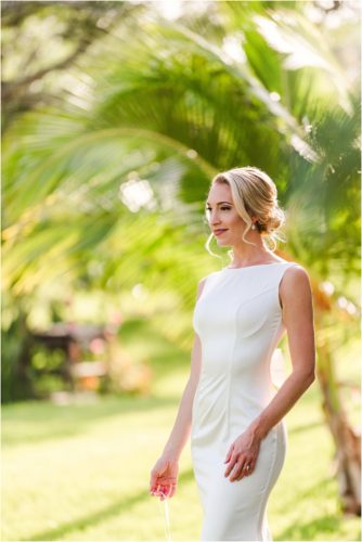 Bride with sun glowing during Melbourne Beach vow renewal inspired shoot