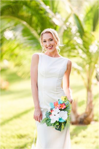 Bride with tropical bouquet during Melbourne Beach vow renewal inspired shoot