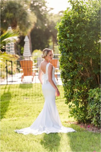 Bride glowing in the sun during Melbourne Beach vow renewal inspired shoot
